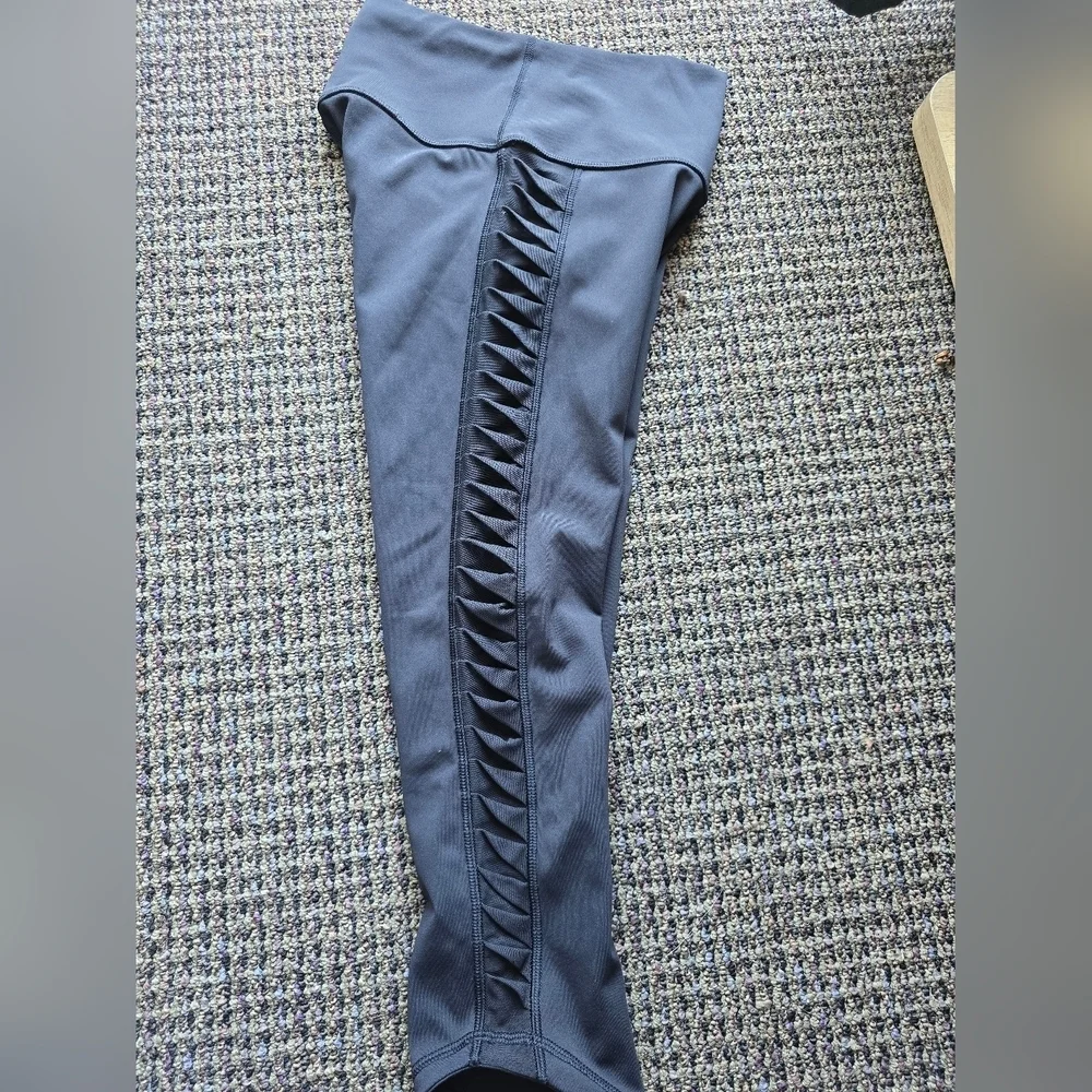 Lululemon Athletica Black Capris with Mesh Accents